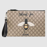 Bee print GG Supreme pouch